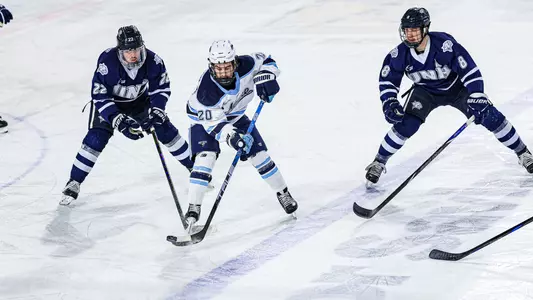 Josh Nadeau carries the puck.