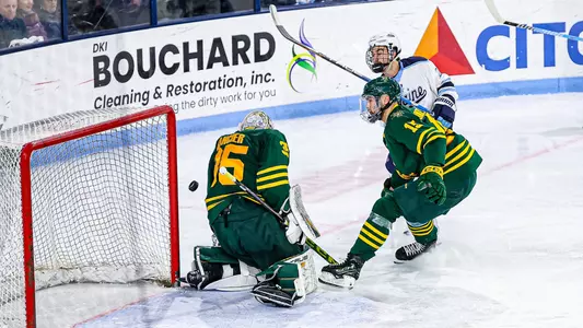 Josh Nadeau shoots the puck against Vermont.