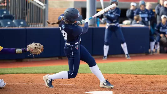 Abby Ree swings at the plate.
