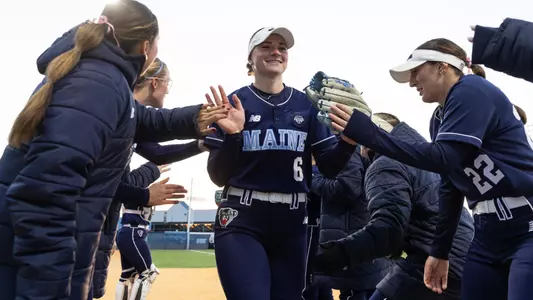 Maggie Helms smiles during pregame intros.