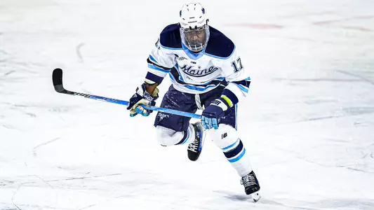 Ross Mitton skates up the ice.