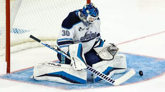 Albin Boija makes a save.