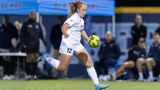 Abby Kraemer controls the soccer ball.