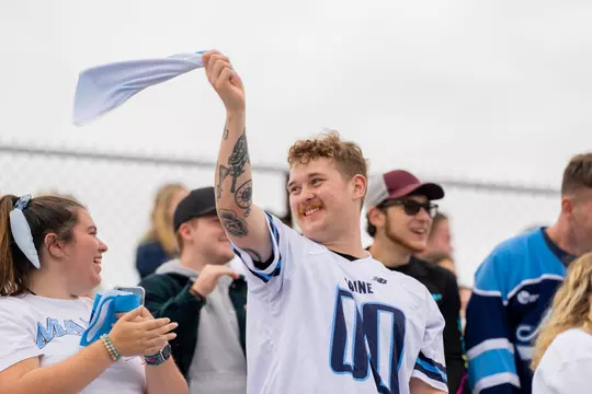 Students, alumni, fans, and others celebrate homecoming at the University of Maine vs Monmouth football game. 101522