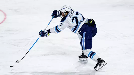 Max Scott takes a shot.