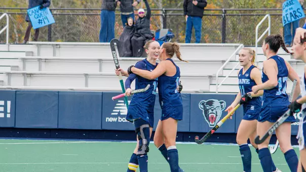 Team celebrating Taylor Stanford's opening goal