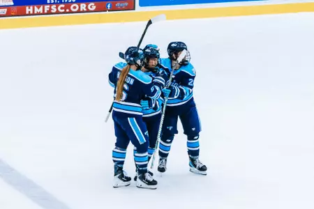 Team celebrates Austefjord's first goal