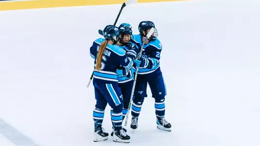 Team celebrates Austefjord's first goal