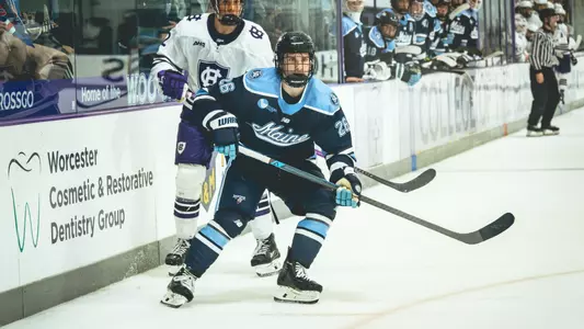 Rowan Calvert skates through the offensive zone.