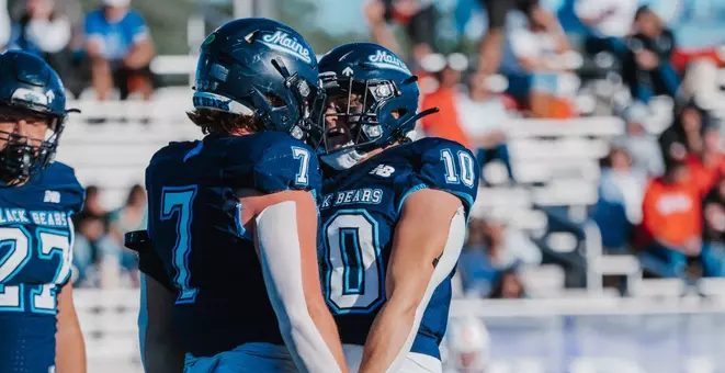 Sam Oppenheimer and Noah Carpenter celebrate a sack