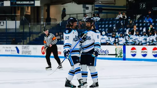 Brenna Curl and Lulu Rucinski during break in action