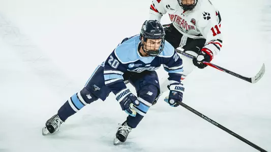 Josh Nadeau in the neutral zone against Northeastern.