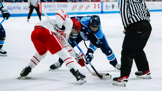 Max Scott takes a faceoff