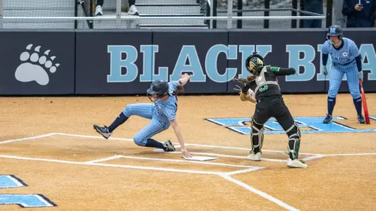 Keira Inman slides into home