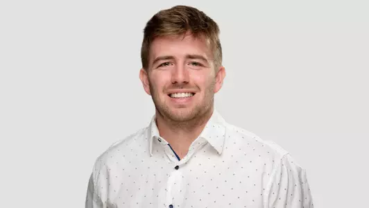 Samuel Tremblay poses for outstanding graduating student accolade