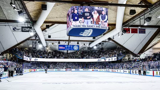 Wide shot of Alfond ARena during a men's hockey game.