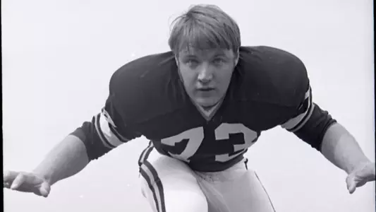 A posed photo of football alum Dick Todd.