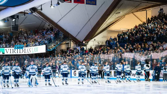 Maine men's hockey stands on the blueline during the national anthem.