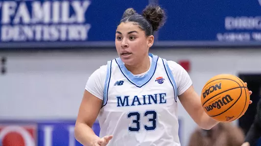 Adrinna Smith dribbles against Binghamton.