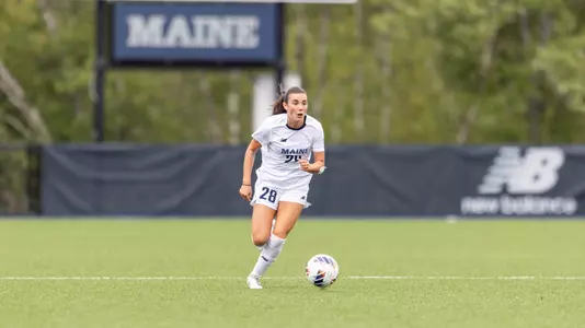 Sandrine Brault runs up the field.