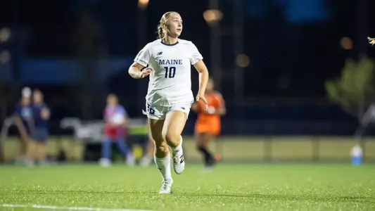 Ashley Kraemer runs up the field.