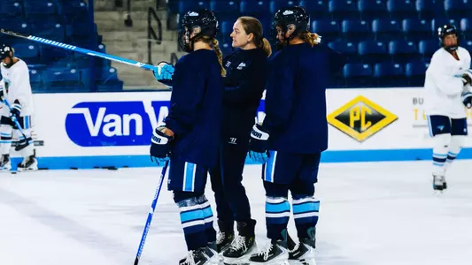 Assistant Coach Taylor Leech on ice