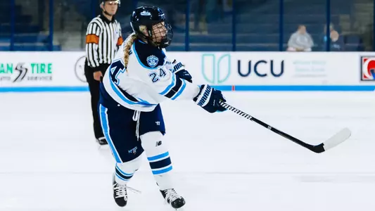 Charlotte Wensley with the puck