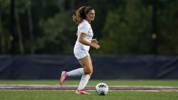 Aja Turner dribbles the ball.
