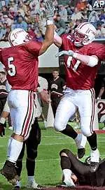 Marcel Shipp (left) and <br> Sean Higgins (right) were <br> two of the Minutemen <br> honored by Teamlink.com.