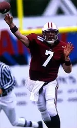 Kelly Seibert passed for two touchdowns and scored a third all in the first half of the Minutemen's 33-10 thrashing of Maine.