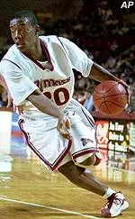 Massachusetts' Shannon Crooks drives to the hoop for two of his 20 points during the first half Saturday.