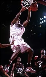 Kitwana Rhymer scored the game-clinching layup in overtime as UMass beat Temple, 65-64 on Saturday.