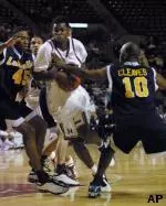 Raheim Lamb is double teamed by La Salle's Rasual Butler and Mike Cleaves during UMass' 62-47 win on Saturday night.
