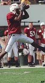 Wide receiver Joe Bruce pulls down a pass during the Minuteman's big win over AIC.