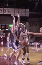 Jen Butler scored 14 points and pulled down 14 rebounds, but the Minutewomen lost to GW, 65-59 Thursday night in overtime.