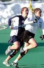 Jada Emery scored the first three goals of the second half to help UMass defeat Harvard 12-7.