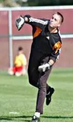 Colin Burns makes two stops in goal for UMass. (file photo)