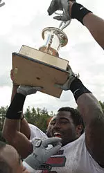 Steve Baylark, who won the Knight Trophy against UNH, piles on more honors.