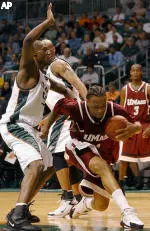 Rashaun Freeman works to control the basketball in the post on Sunday at Miami.