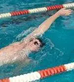 Justin Zeimetz won three individual events and was a member of two winning relay teams at the championship meet.