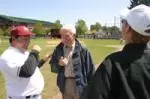 Assistant coach Dave Betterncourt shares a laugh with former UMass baseball head coach and Athletic Hall of Fame inductee Dick Berquist this past Saturday.
