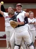UMass pitcher Brandice Balschmiter and catcher KJ Kelley celebrate after winning the A-10 title on Saturday.