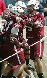 UMass celebrates it win over Hofstra to reach the NCAA Semifinals.