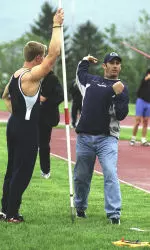 Mark Gottdenker (right) has been named the new UMass Track & Field assistant coach.