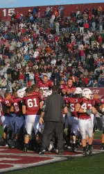 The Minutemen celebrated on the field after defeating Villanova 32-24 in 4-OT.