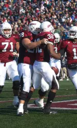 The team gathering after a touchdown vs. New Hampshire.
