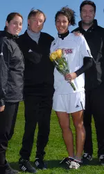 Nunes on Senior Day with (from left to right): assistant coach Angela Napoli, head coach Jim Rudy, and assistant coach Christopher Streeter.