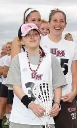 Lexie enjoys a moment on the sidelines prior to the La Salle game on Sunday.