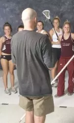 Photographer Ben Barnhart works with four pairs of sisters for a photo featured in this summer's UMass Magazine.