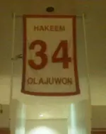 The jersey of Hakeem Olajuwon hangs in Hofheinz Pavilion as one of five retired numbers.